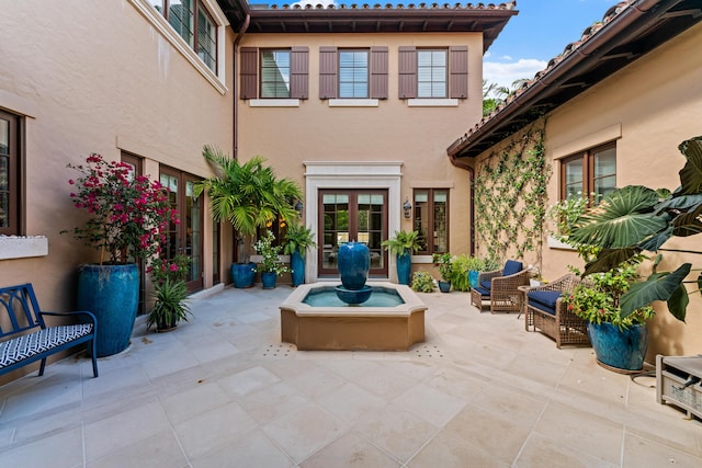 view of patio / terrace featuring french doors