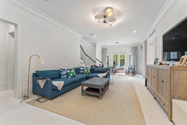 living room with crown molding and french doors