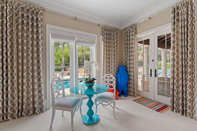 interior space featuring french doors and ornamental molding