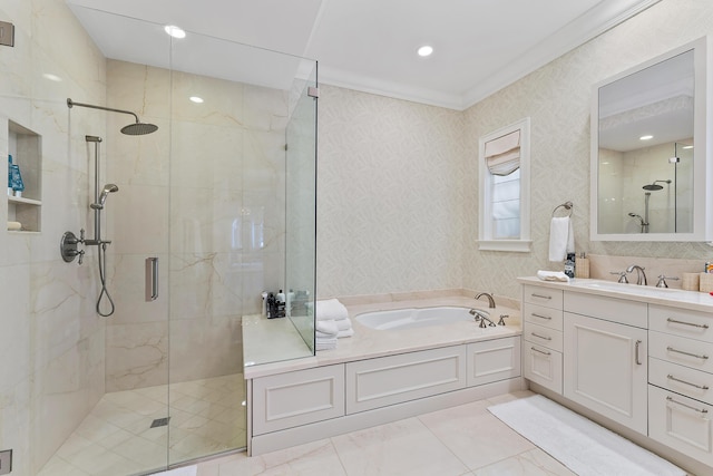 bathroom featuring crown molding, vanity, and independent shower and bath