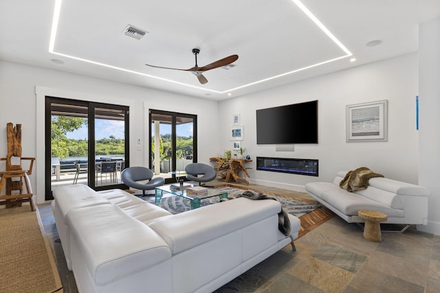 6787 Bayshore Dr, Lake Worth, FL 33462 - living area featuring ceiling fan, plenty of natural light, baseboards, and recessed lighting