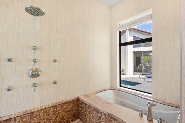 6787 Bayshore Dr, Lake Worth, FL 33462 - full bath featuring a tile shower and a tub with jets