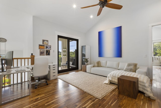 living room with dark wood-type flooring, ceiling fan, and high vaulted ceiling