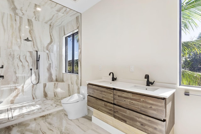 bathroom featuring a shower, vanity, toilet, and tile patterned floors