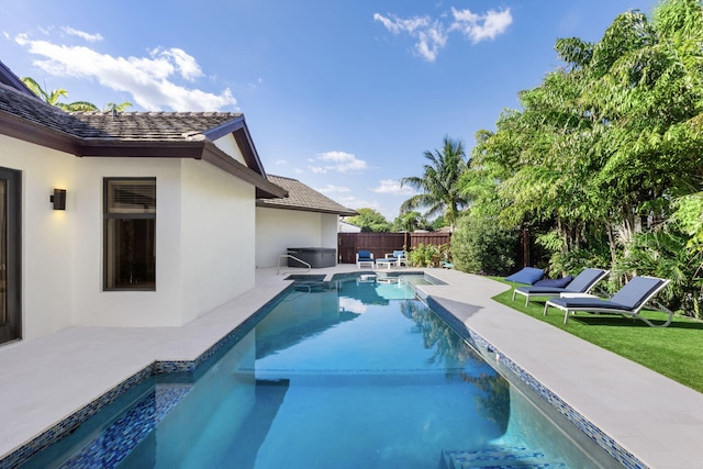 view of pool featuring a patio