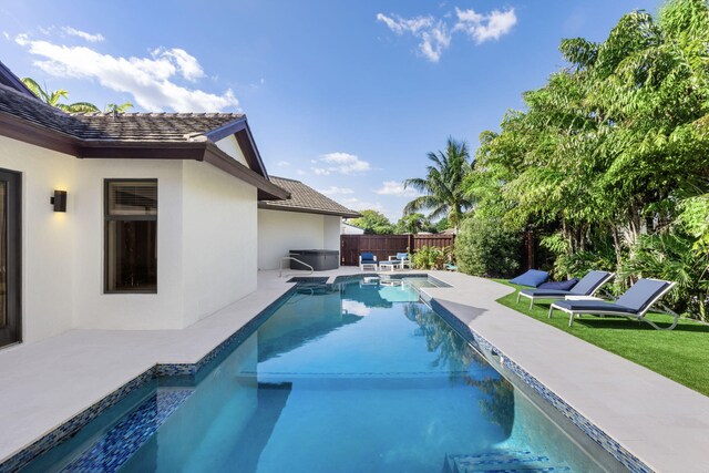 6787 Bayshore Dr, Lake Worth, FL 33462 - view of pool with a patio area and a fenced backyard