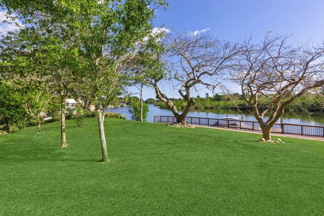 6787 Bayshore Dr, Lake Worth, FL 33462 - view of yard featuring a water view