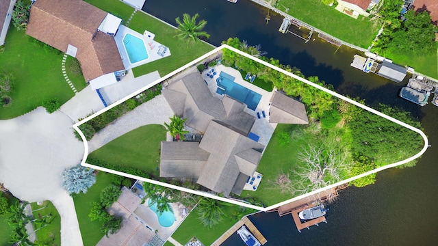 birds eye view of property featuring a water view