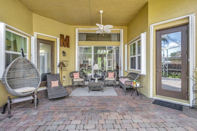 view of patio / terrace featuring outdoor lounge area and ceiling fan