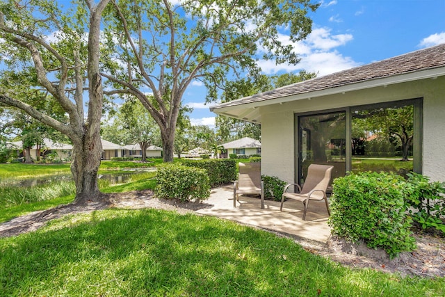 view of yard with a patio area