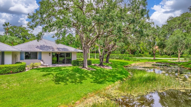 view of yard with a water view