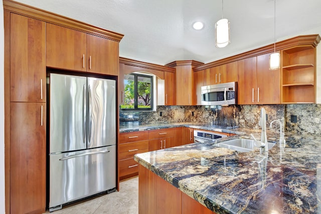 kitchen with stainless steel appliances, decorative backsplash, sink, light tile patterned floors, and dark stone counters