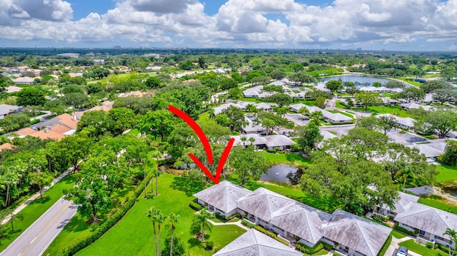 aerial view featuring a residential view and a water view