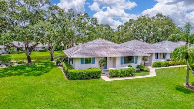 single story home with a front yard