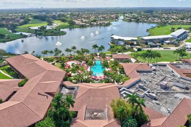 birds eye view of property with a water view