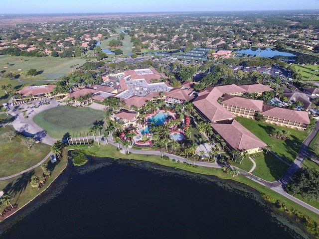 birds eye view of property featuring a residential view and a water view