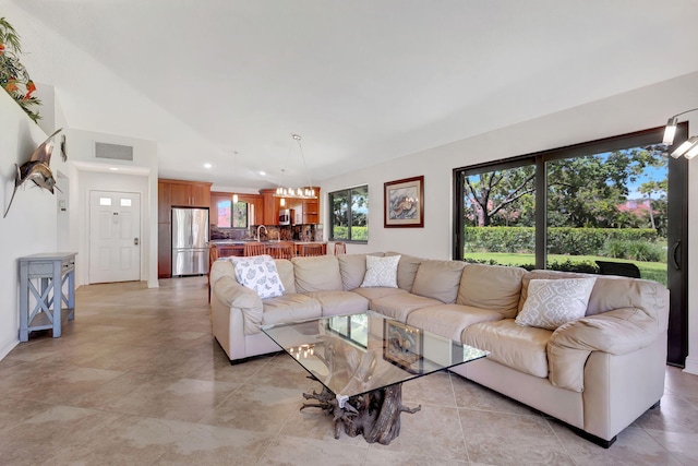 living room with light tile patterned floors