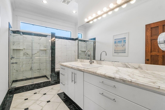 full bath featuring plenty of natural light, visible vents, crown molding, and a shower stall