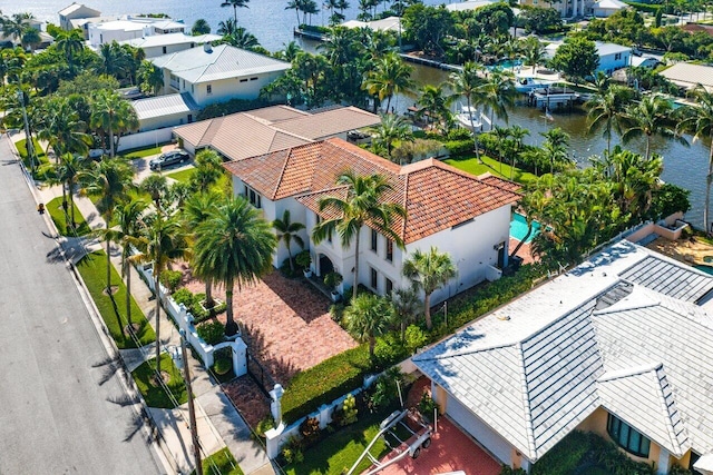 bird's eye view featuring a residential view and a water view