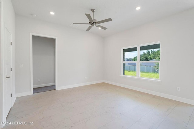 empty room featuring ceiling fan