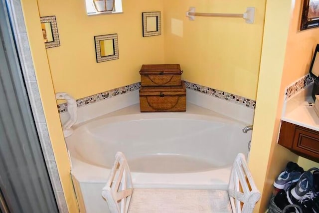 bathroom featuring a bath