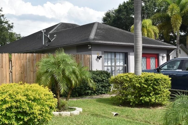 view of front of home with a front yard