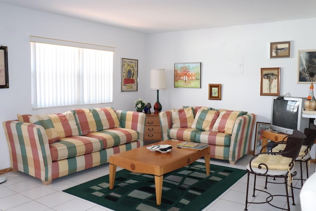 living room with light tile patterned flooring