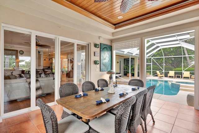 dining area with ceiling fan and light tile patterned floors