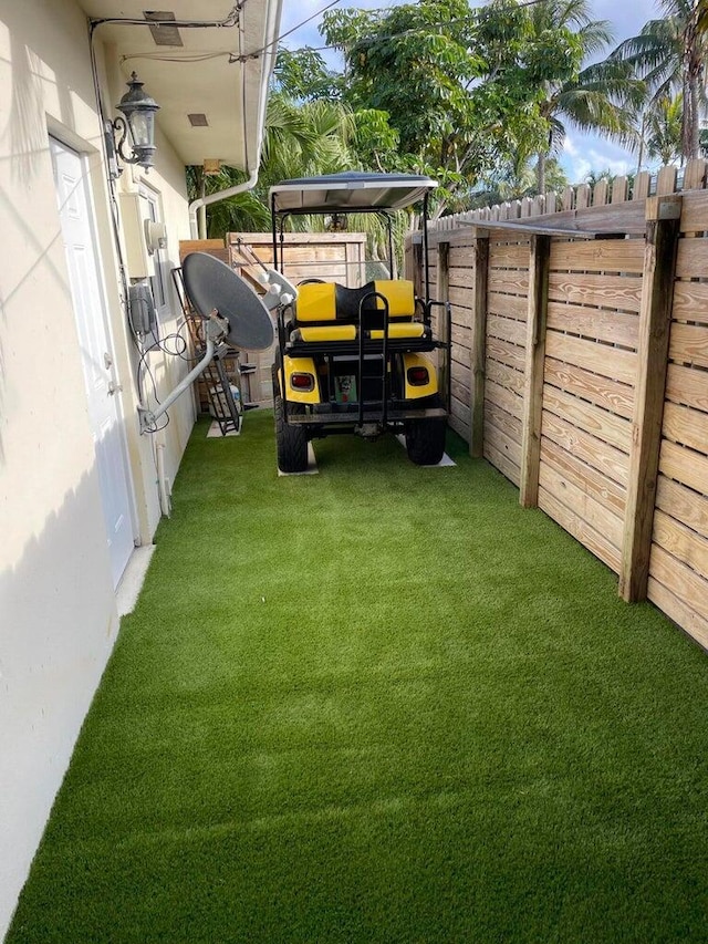 view of yard with a fenced backyard