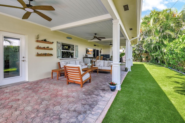 view of patio featuring an outdoor living space and a ceiling fan