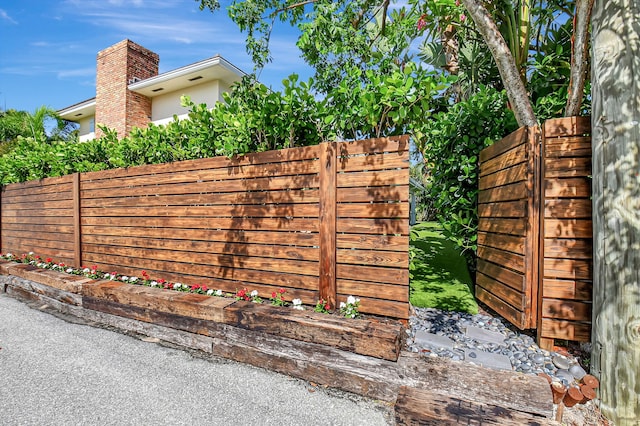 view of gate featuring fence