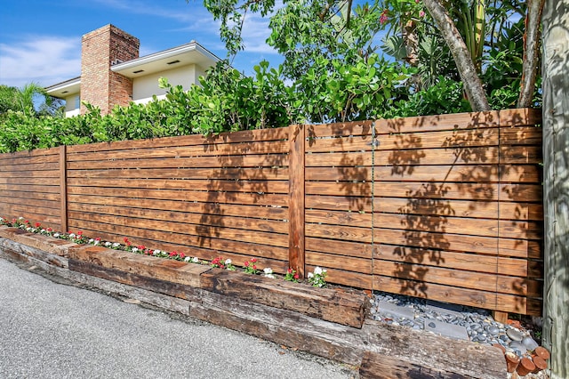 view of gate featuring fence