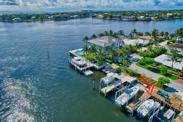 birds eye view of property featuring a water view