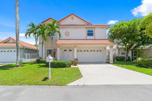 mediterranean / spanish-style home with a garage and a front lawn