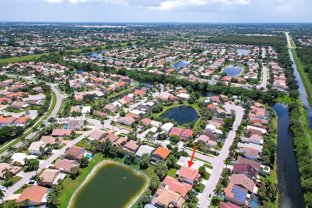 drone / aerial view featuring a water view