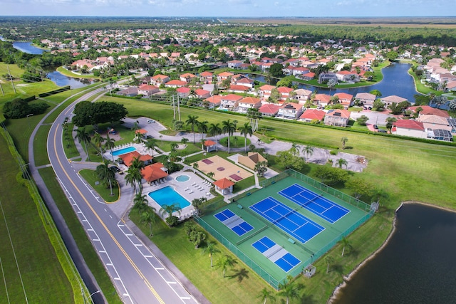 bird's eye view with a water view