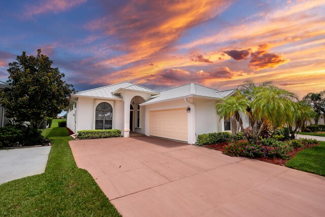 view of front of property featuring a garage