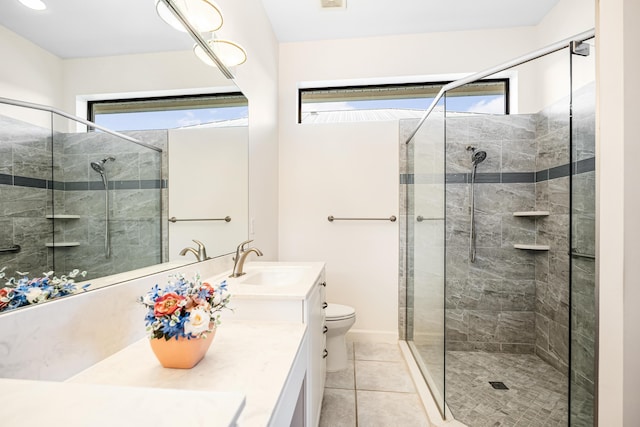 bathroom with toilet, a stall shower, tile patterned flooring, and vanity