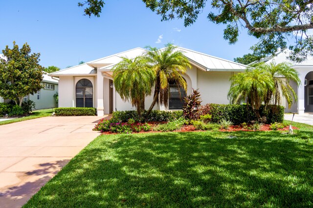 view of front of home with a front yard