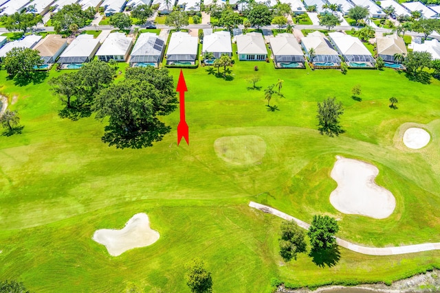 aerial view with a residential view and golf course view