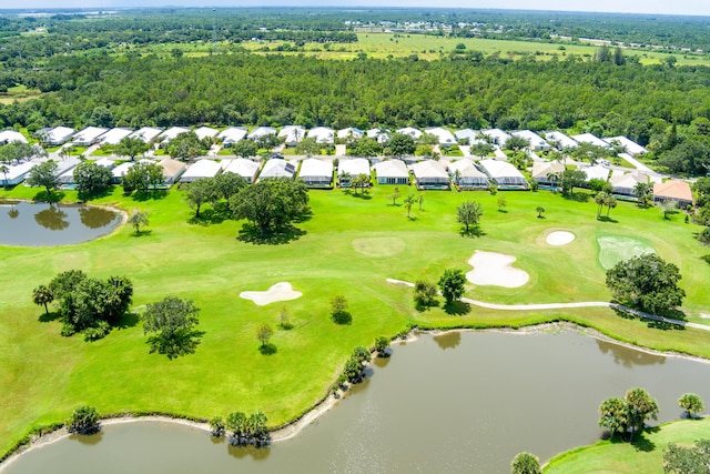 bird's eye view featuring a residential view, view of golf course, a water view, and a forest view