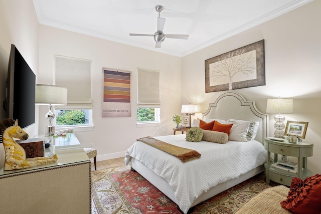 bedroom featuring ceiling fan, hardwood / wood-style floors, and ornamental molding