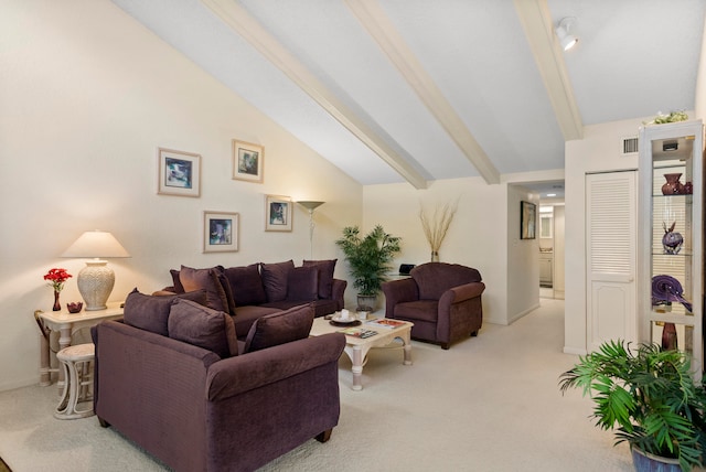 carpeted living room featuring high vaulted ceiling and beamed ceiling