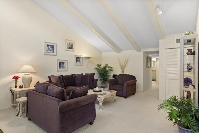 living room featuring vaulted ceiling with beams, light carpet, and visible vents