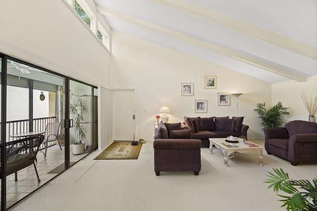 carpeted living area with high vaulted ceiling, beamed ceiling, tile patterned flooring, and a wealth of natural light