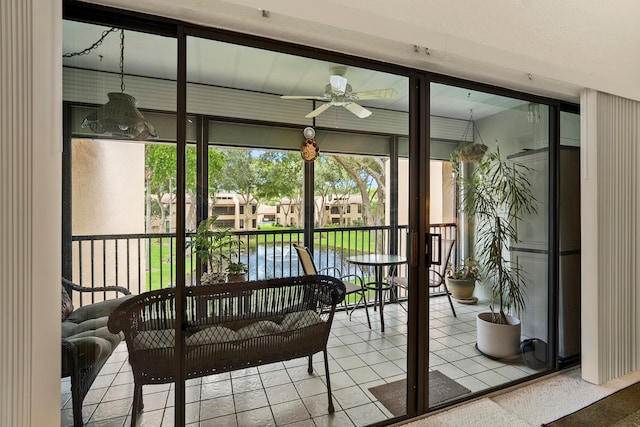 sunroom / solarium with ceiling fan