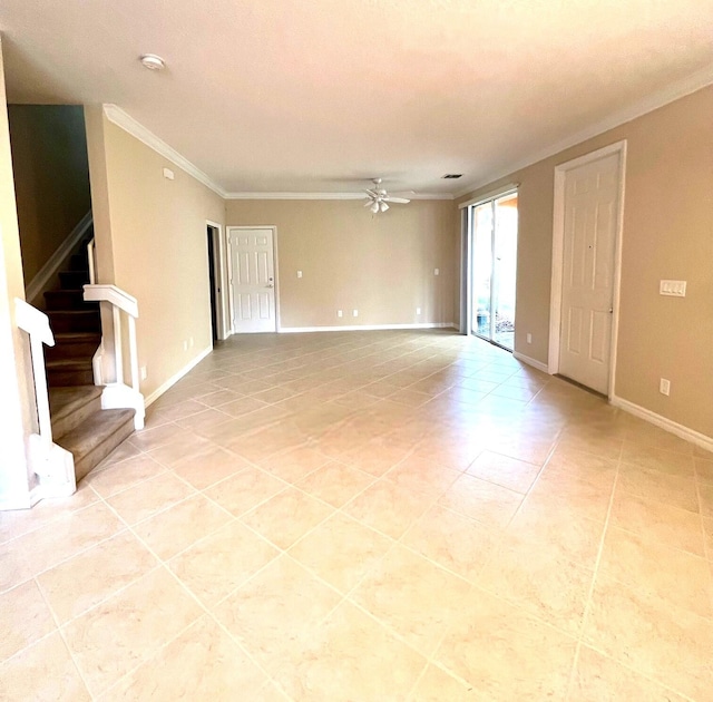 tiled spare room featuring ceiling fan and ornamental molding