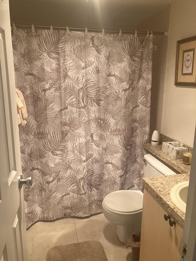 full bath with tile patterned floors, vanity, toilet, and a shower with shower curtain