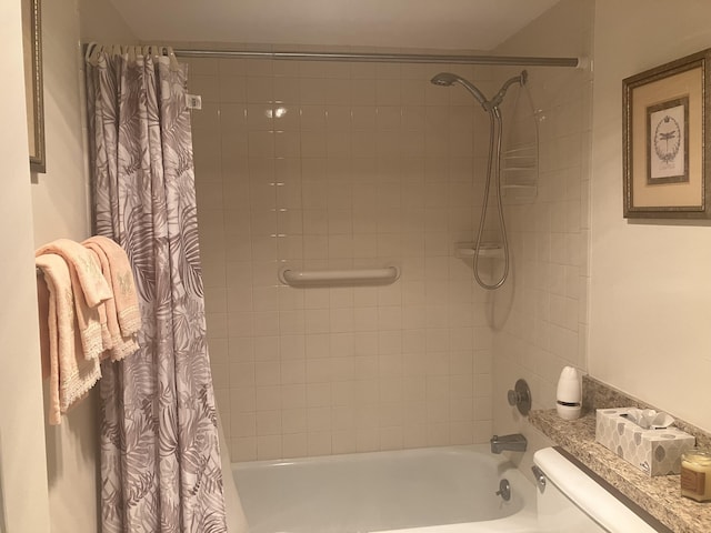 full bathroom with toilet and shower / tub combo