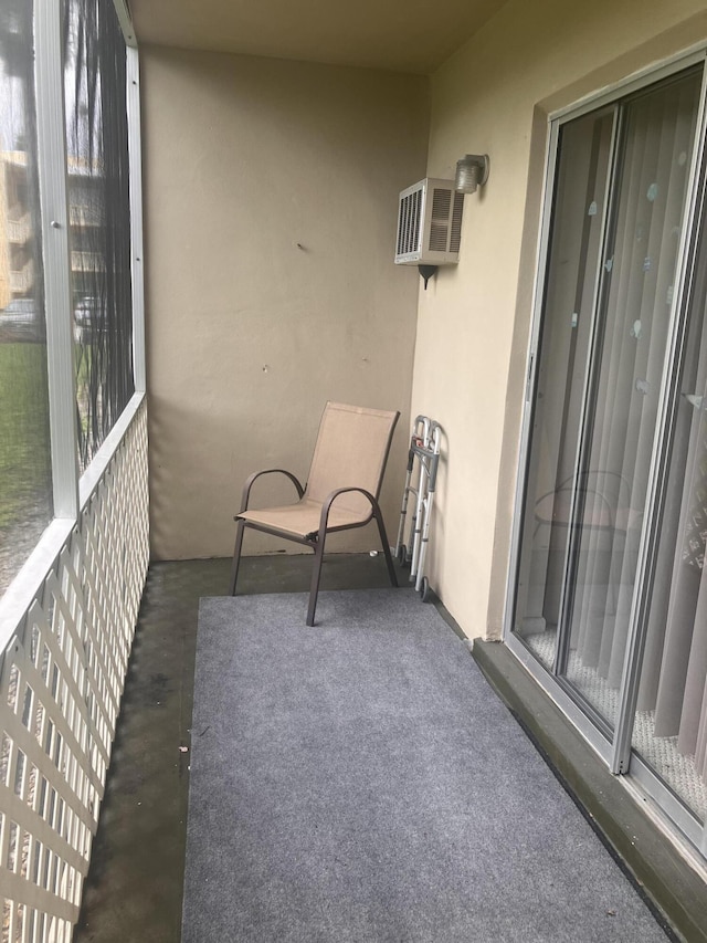 exterior space featuring a wall mounted air conditioner